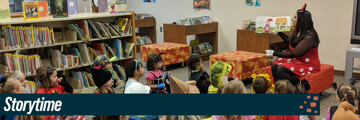 Storytime header showing a group of children listening to reader during storytime