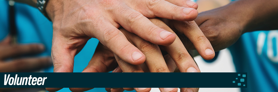 Volunteer header showing hands piled on top of each other