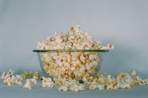Glass bowl of popcorn