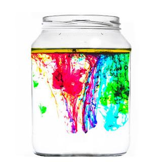 Clear jar with bright colors interspersed.